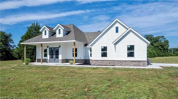 4.6 Acres of Residential Land with Home for Sale in Sallisaw, Oklahoma