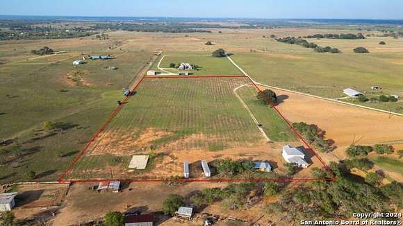 12.78 Acres of Land with Home for Sale in Floresville, Texas