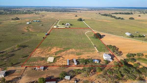 12.8 Acres of Land with Home for Sale in Floresville, Texas