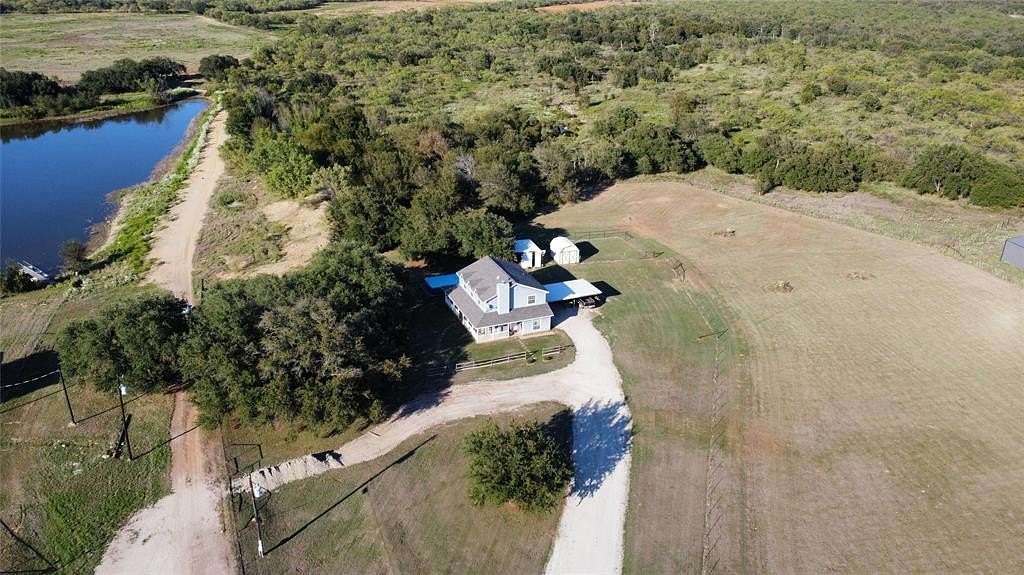 5 Acres of Residential Land with Home for Sale in Graham, Texas