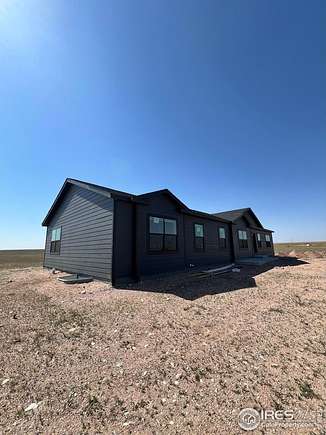 38.8 Acres of Land with Home for Sale in Pierce, Colorado