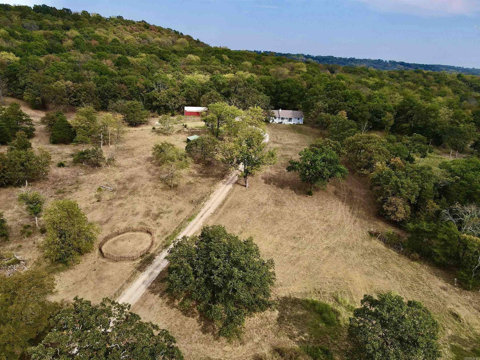 15 Acres of Land with Home for Sale in Berryville, Arkansas