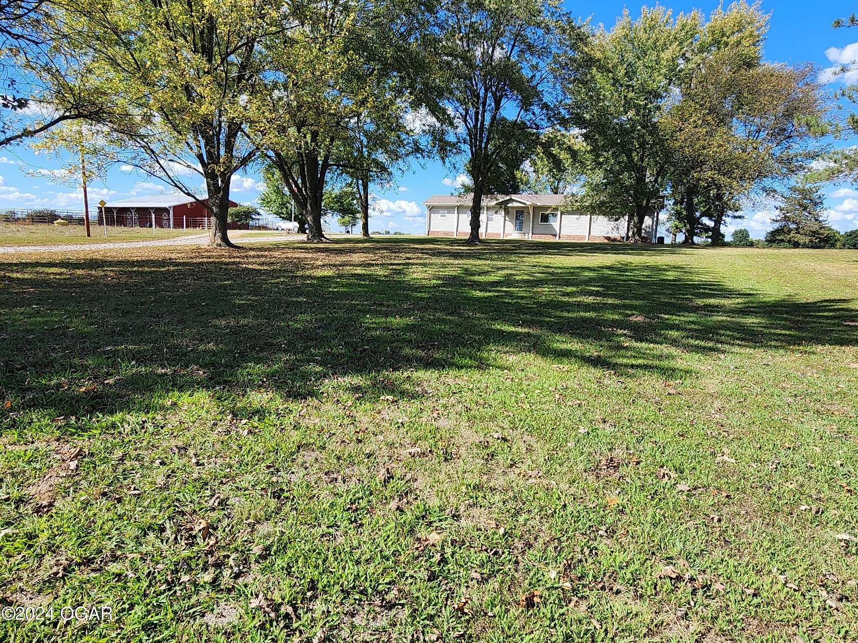 8 Acres of Land with Home for Sale in Lamar, Missouri