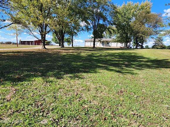 8 Acres of Land with Home for Sale in Lamar, Missouri