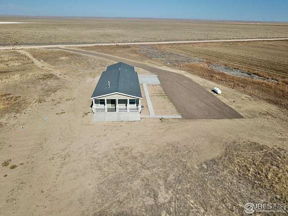 40 Acres of Land with Home for Sale in Briggsdale, Colorado