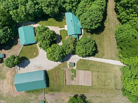 7 Acres of Land with Home for Sale in Evart, Michigan