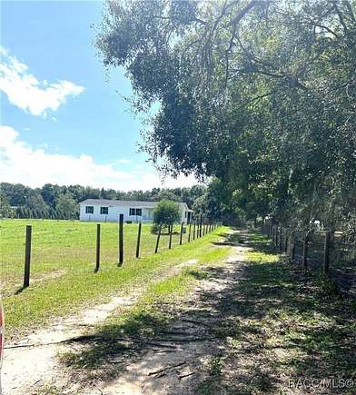 2.4 Acres of Residential Land with Home for Sale in Floral City, Florida