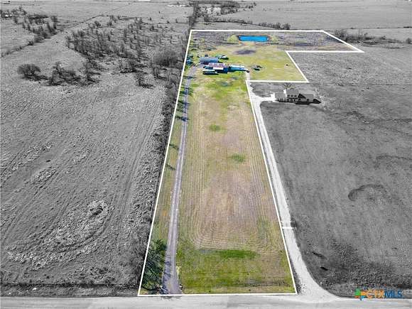 14.881 Acres of Land with Home for Sale in Rogers, Texas