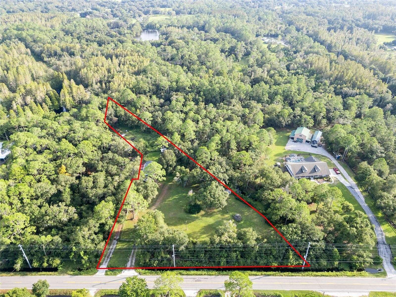 2.89 Acres of Residential Land with Home for Sale in Lakeland, Florida