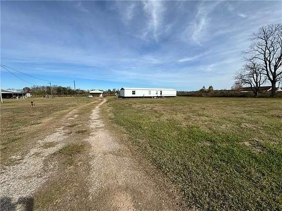 6.98 Acres of Residential Land with Home for Sale in Plaucheville, Louisiana