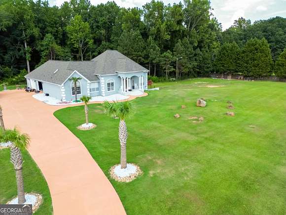 5.23 Acres of Land with Home for Sale in Hampton, Georgia