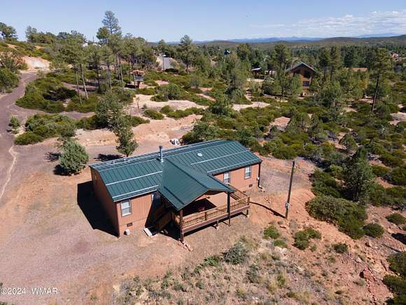 4.22 Acres of Residential Land with Home for Sale in Show Low, Arizona