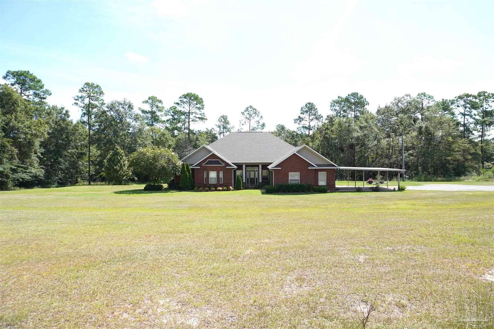 10 Acres of Residential Land with Home for Sale in Milton, Florida