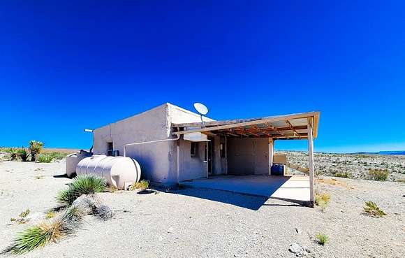 23.07 Acres of Land with Home for Sale in Terlingua, Texas