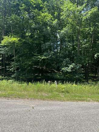 0.3 Acres of Residential Land for Sale in Canadian Lakes, Michigan