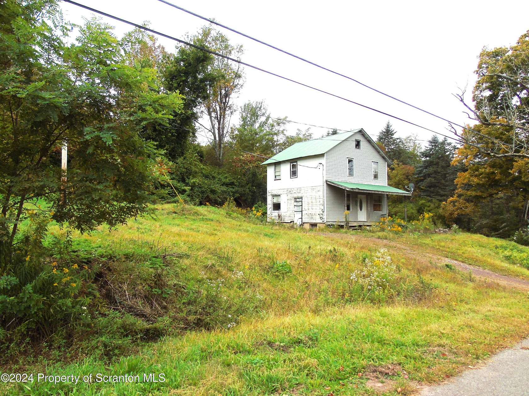 14.6 Acres of Land with Home for Sale in Madison Township, Pennsylvania