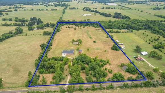 16.26 Acres of Land with Home for Sale in Sulphur Springs, Texas