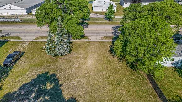 0.43 Acres of Commercial Land for Sale in Hart, Michigan