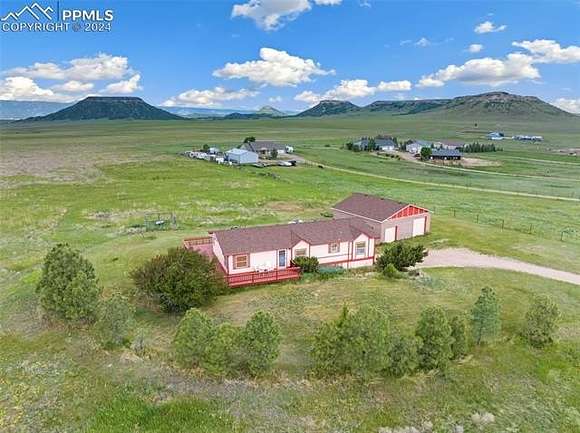 10.01 Acres of Recreational Land with Home for Sale in Larkspur, Colorado