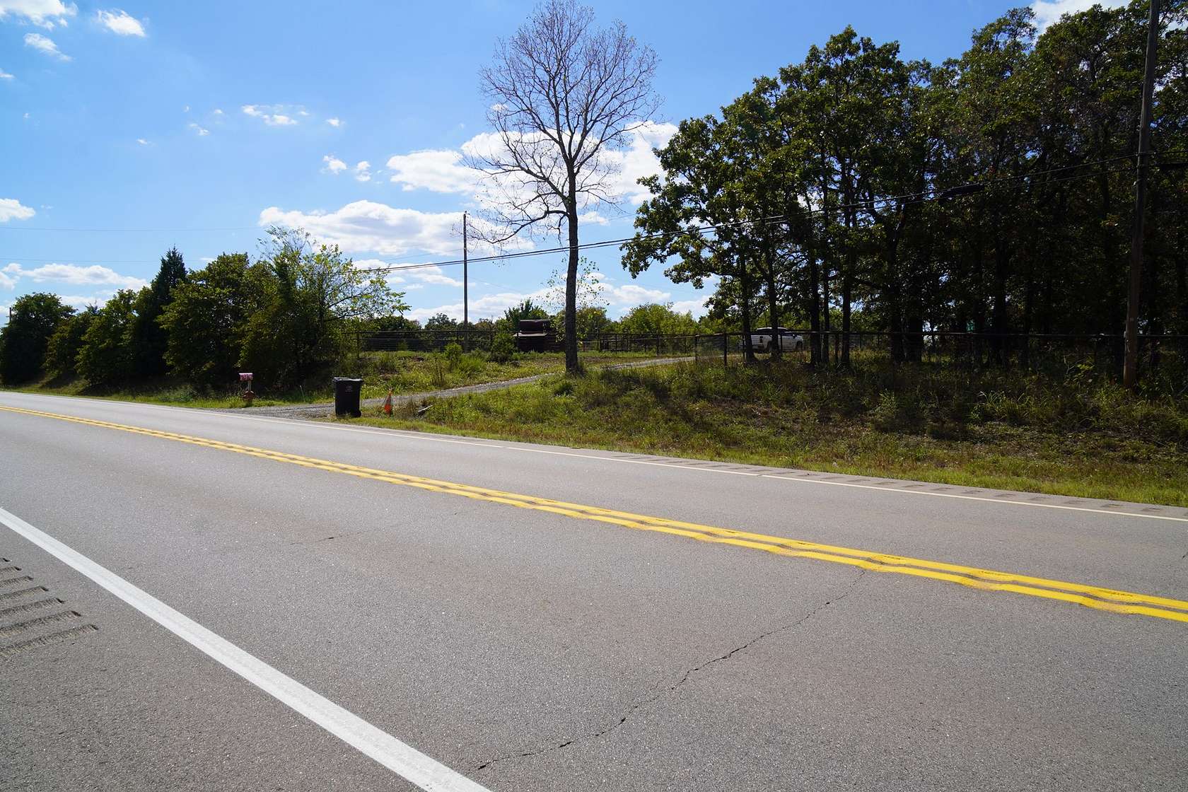 11.39 Acres of Land with Home for Auction in Meeker, Oklahoma