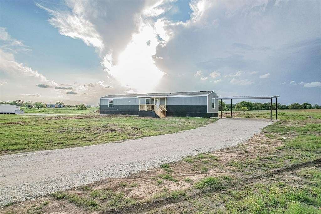 2.73 Acres of Residential Land with Home for Sale in Bowie, Texas