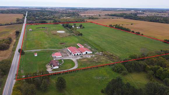 56.9 Acres of Agricultural Land with Home for Sale in Woodstock, Illinois