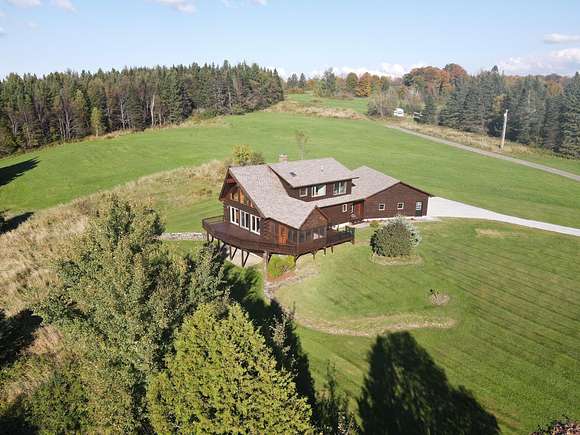 10.06 Acres of Land with Home for Sale in Holland, Vermont