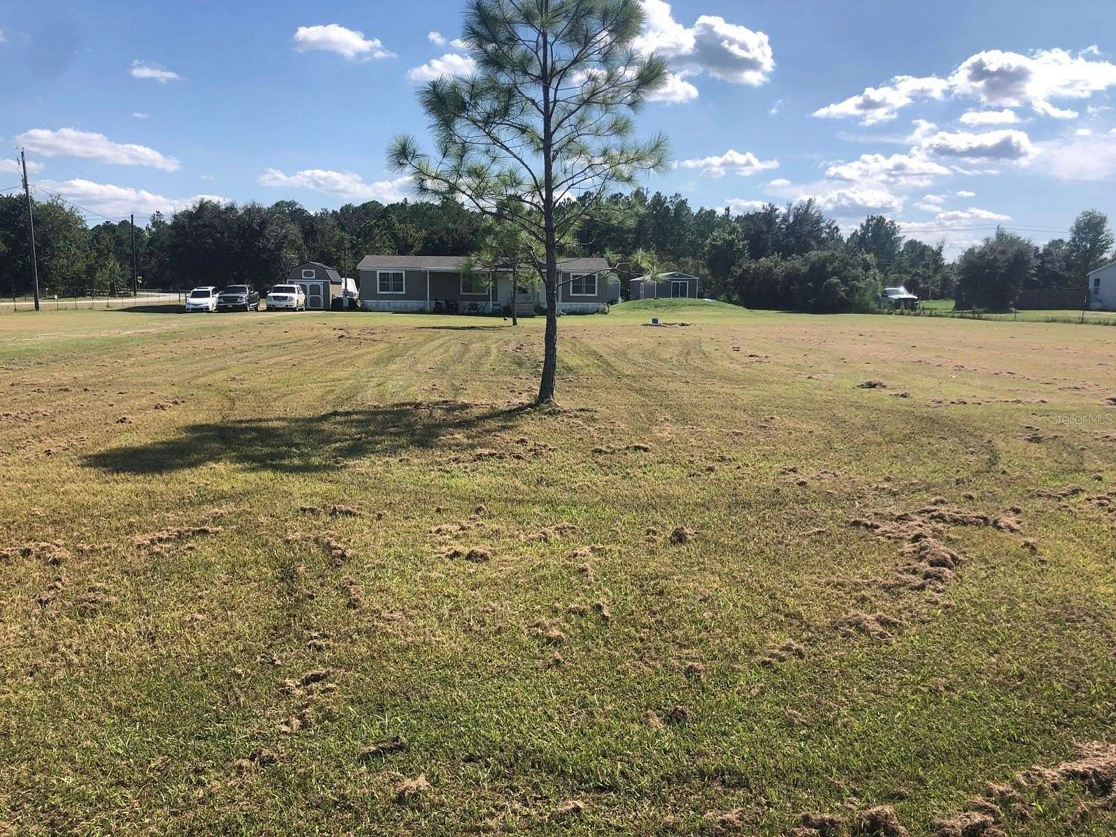 2.06 Acres of Residential Land with Home for Sale in Polk City, Florida