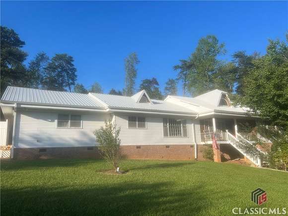 2.62 Acres of Residential Land with Home for Sale in Cumming, Georgia