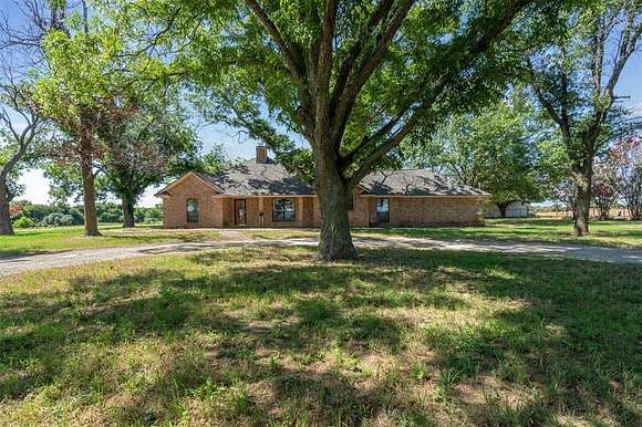 5 Acres of Residential Land with Home for Sale in Poolville, Texas