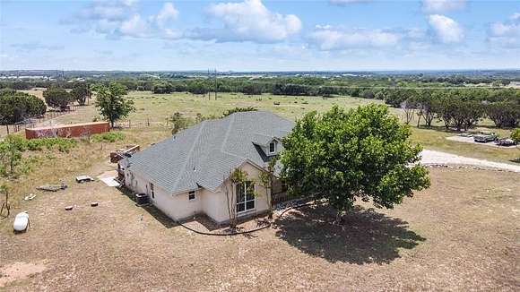 20 Acres of Agricultural Land with Home for Sale in Godley, Texas