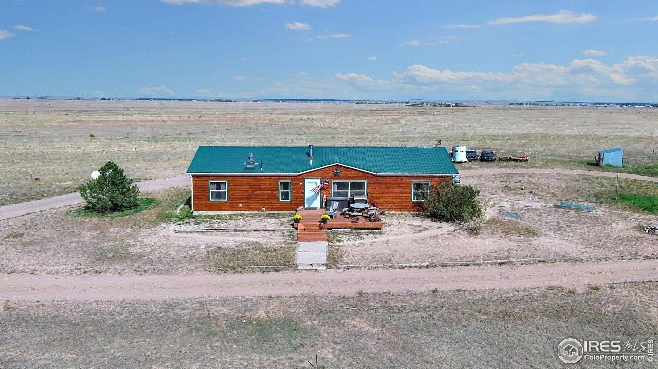 33.6 Acres of Agricultural Land with Home for Sale in Nunn, Colorado