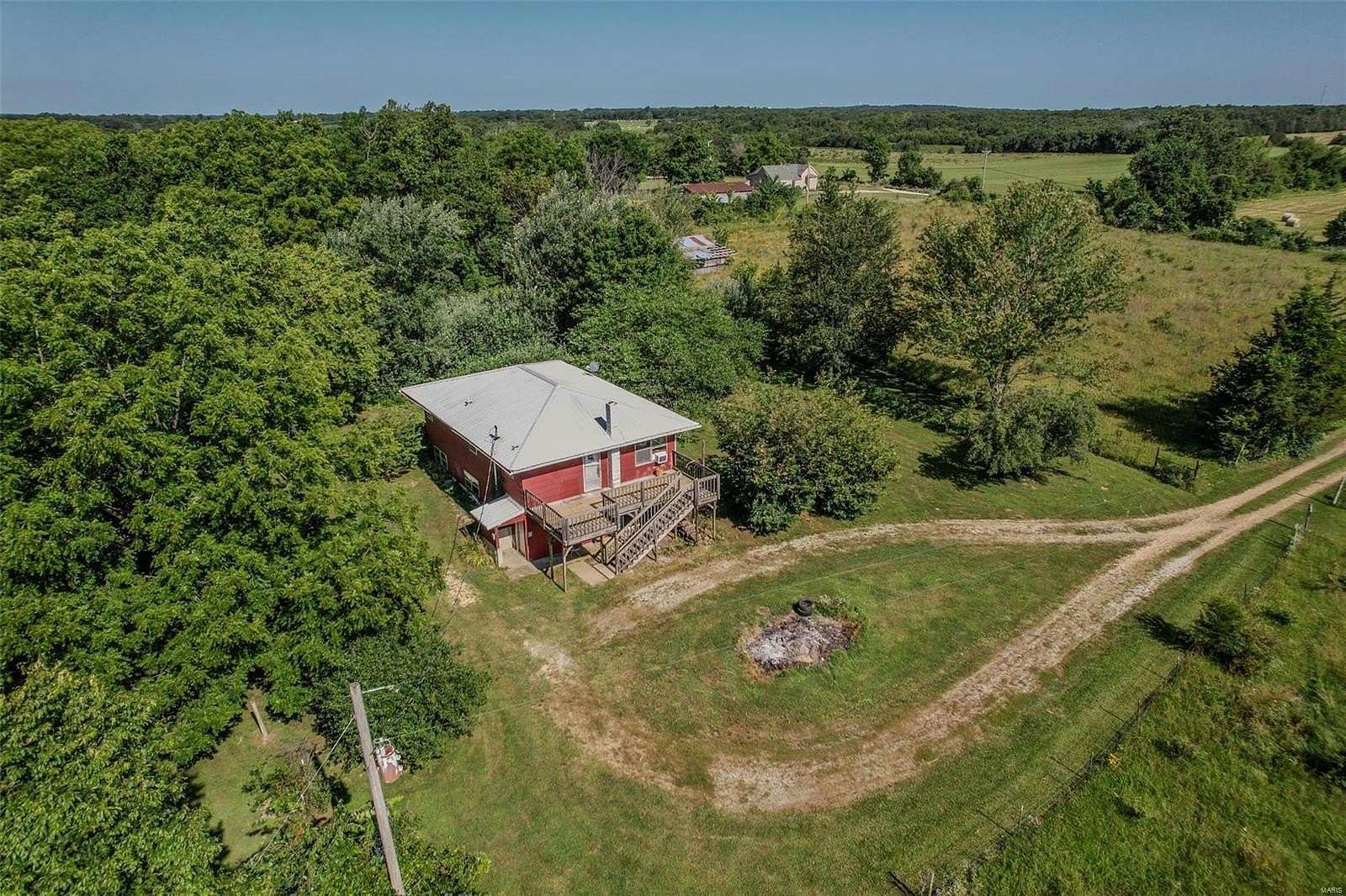 30 Acres of Land with Home for Sale in Lebanon, Missouri