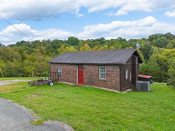 8.18 Acres of Residential Land with Home for Sale in Strawberry Plains, Tennessee