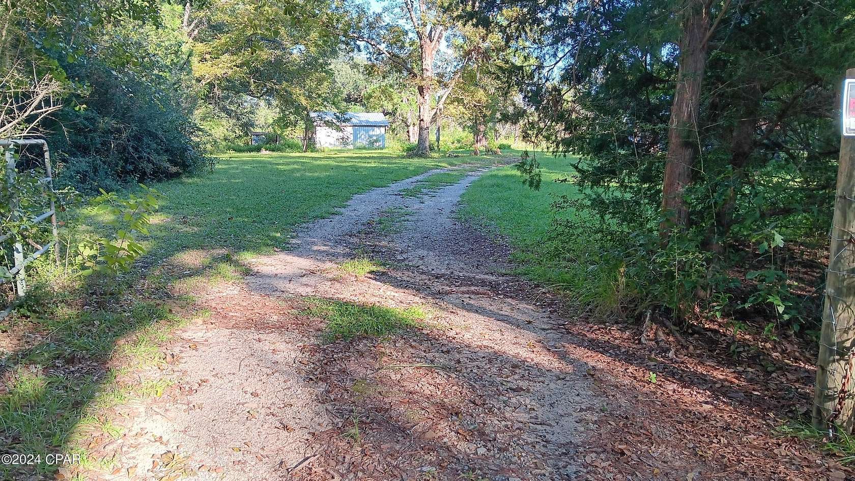 10.8 Acres of Land with Home for Sale in Cottondale, Florida