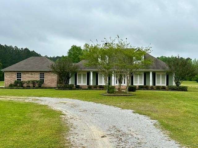 8.9 Acres of Residential Land with Home for Sale in Picayune, Mississippi