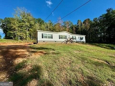 2 Acres of Residential Land with Home for Sale in Cave Spring, Georgia