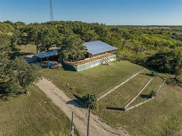 2.658 Acres of Residential Land with Home for Sale in Breckenridge, Texas