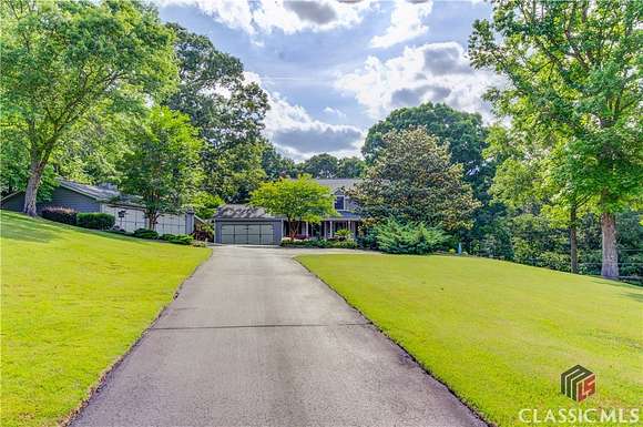 12.59 Acres of Land with Home for Sale in Dacula, Georgia