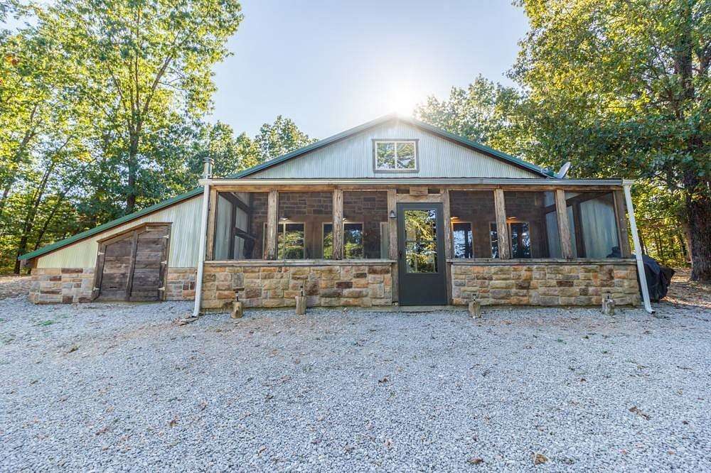 74.9 Acres of Recreational Land with Home for Sale in Windyville, Missouri