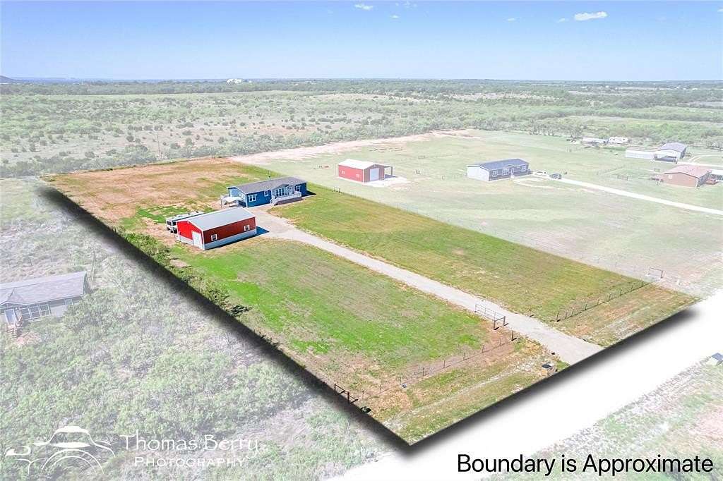 2.5 Acres of Residential Land with Home for Sale in Clyde, Texas