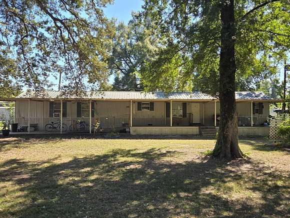 10.17 Acres of Land with Home for Sale in Rayville, Louisiana