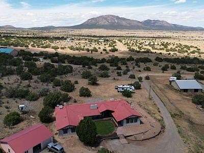 5 Acres of Land with Home for Sale in Edgewood, New Mexico