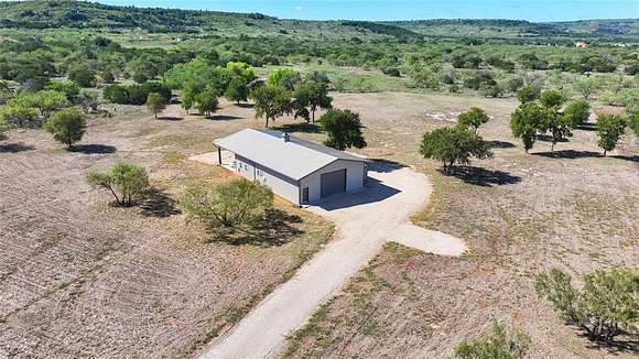 5 Acres of Residential Land with Home for Sale in Palo Pinto, Texas