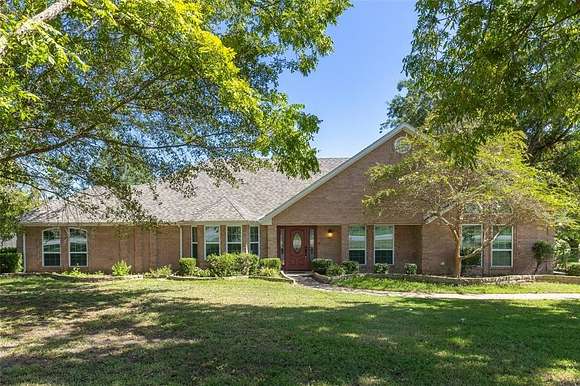 1.63 Acres of Residential Land with Home for Sale in Sulphur Springs, Texas