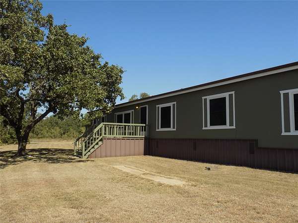 2.77 Acres of Land with Home for Sale in Poolville, Texas