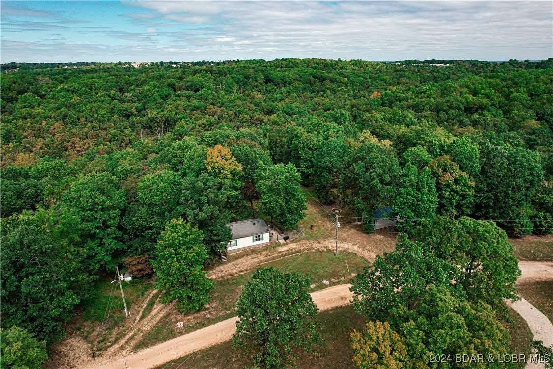 2.41 Acres of Residential Land with Home for Sale in Sunrise Beach, Missouri