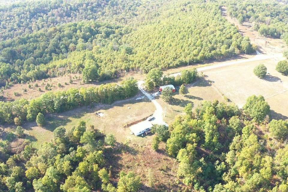 17.5 Acres of Recreational Land with Home for Sale in Tunas, Missouri