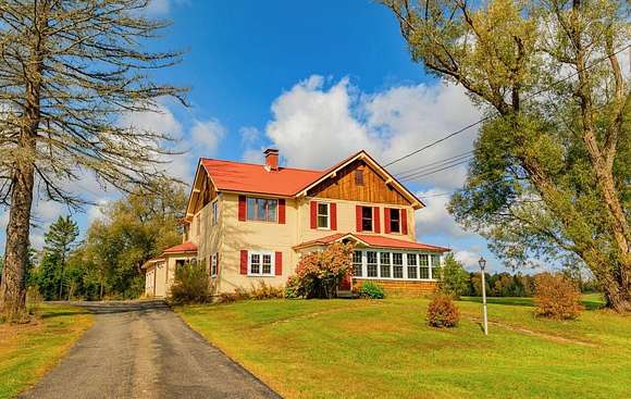 9.1 Acres of Residential Land with Home for Sale in Saranac Lake, New York