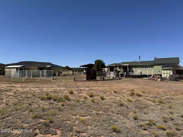 2 Acres of Residential Land with Home for Sale in Seligman, Arizona